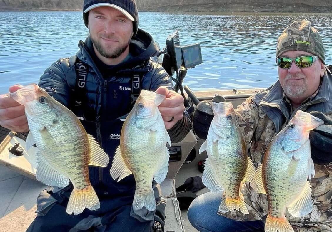 Guide Brian Ondrejka (left) and client John Francis know that the cold of winter can produce hot fishing for crappie. (Courtesy of Brian Ondrejka)