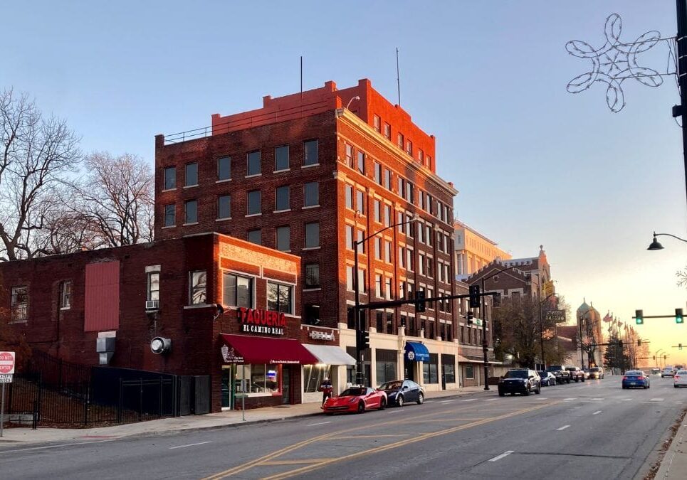 A line of red-brick buildings down 7th Street from the Unified Government City Hall and Wyandotte County Courthouse.