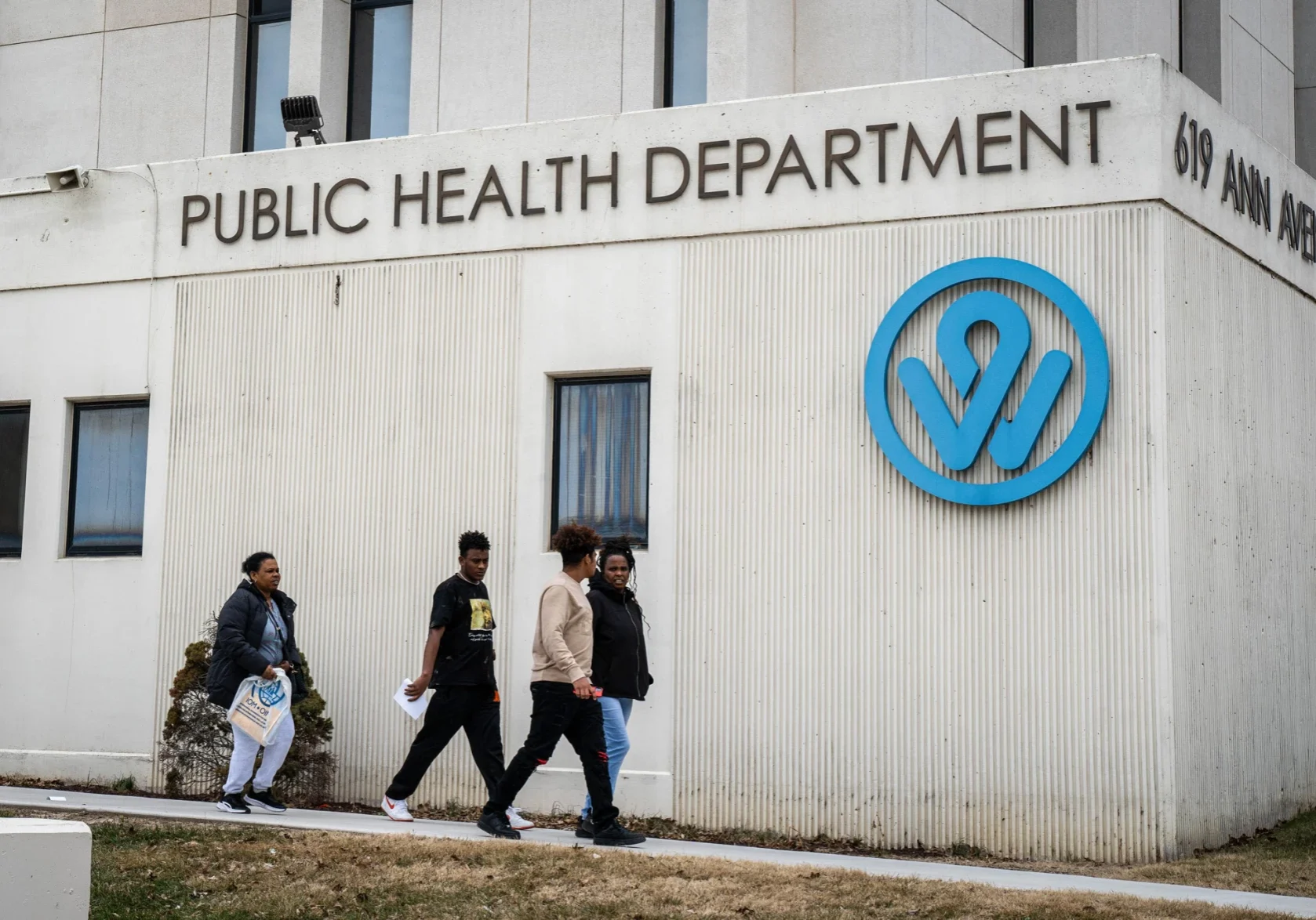 People walk outside the Wyandotte County Public Health Department in Kansas City, Kansas. (Zane Irwin | Kansas News Service